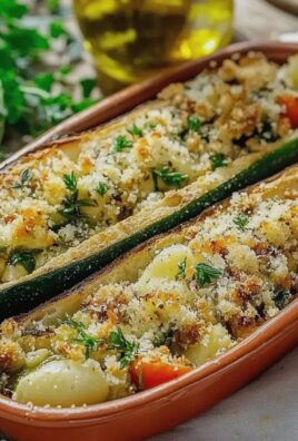 Gefüllte Zucchini mit Couscous und Feta zubereiten